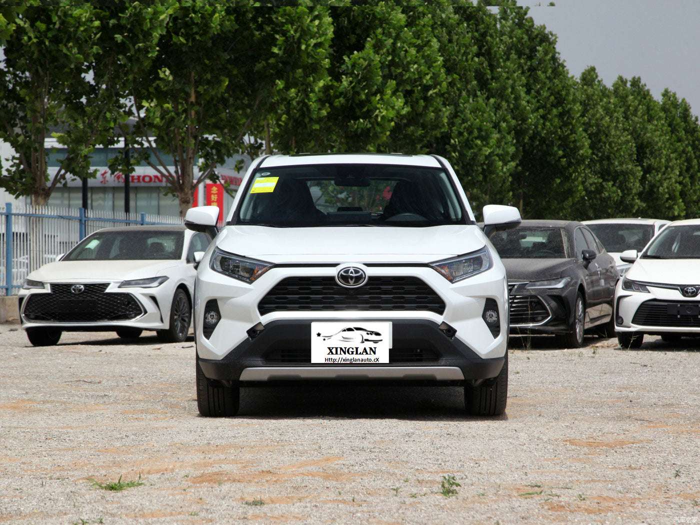 For the Toyota Rav 4 SUV in Japan for adults, featuring left-side power fabric seats and rear camera