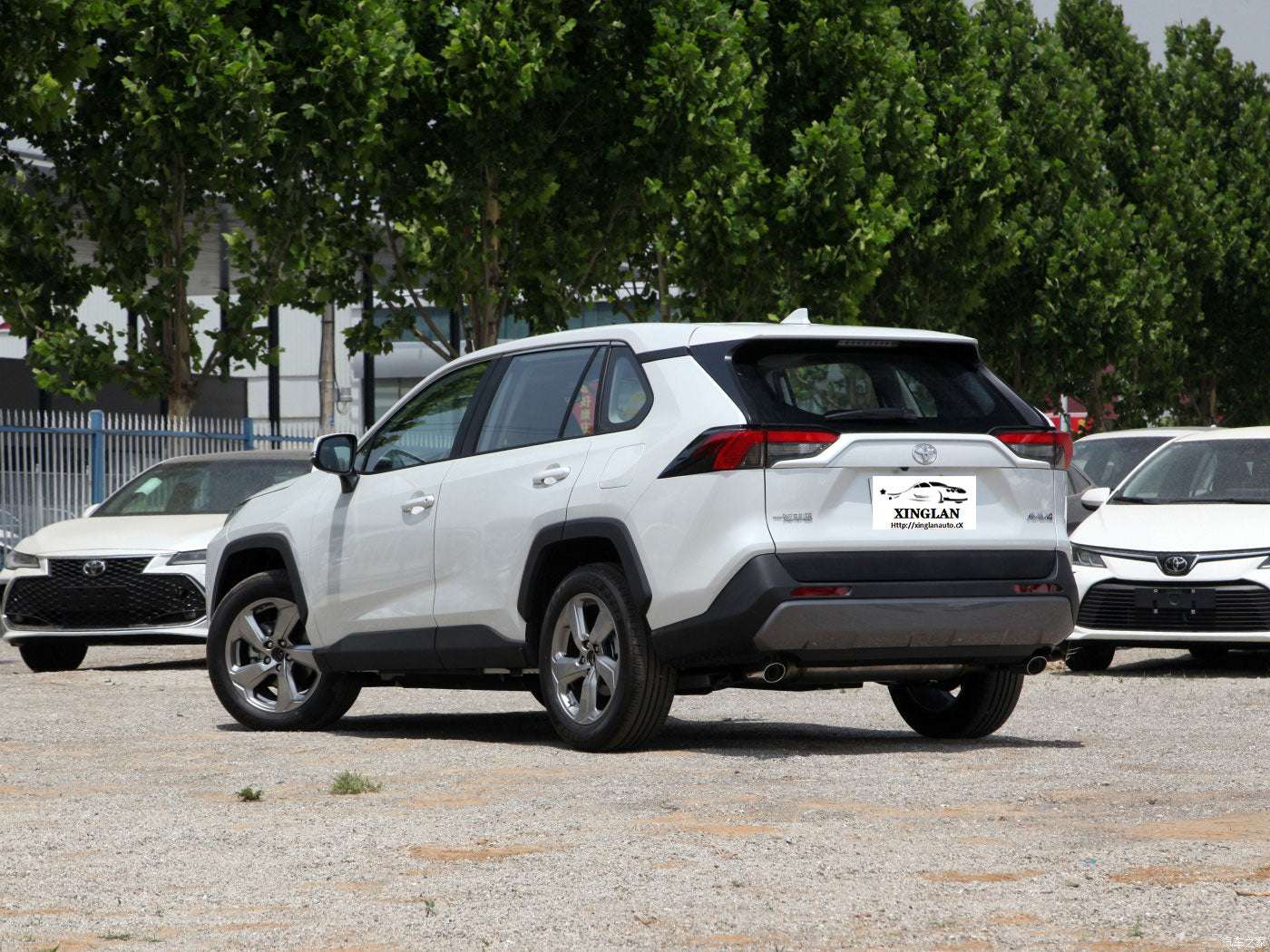 For the Toyota Rav 4 SUV in Japan for adults, featuring left-side power fabric seats and rear camera
